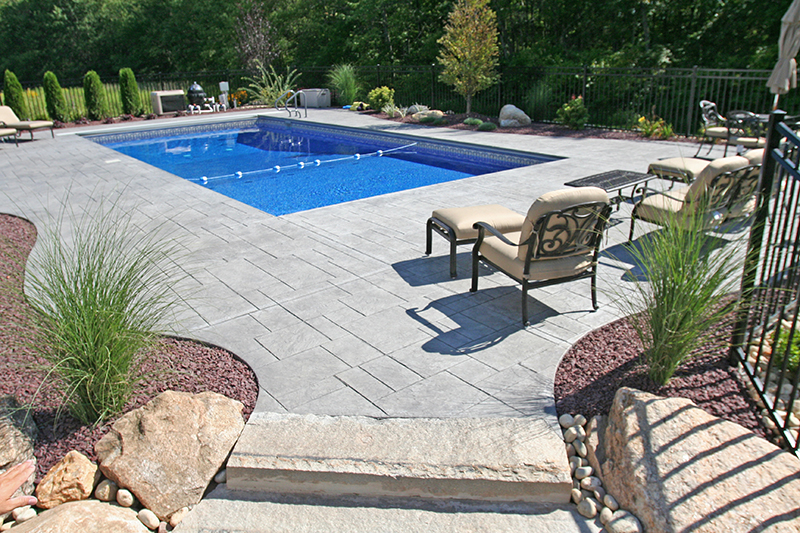 Swimming pool and stamped concrete project example 69